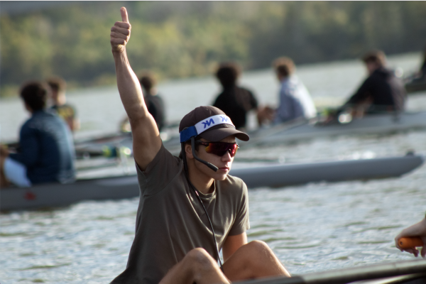 James Palanca (12) gives a thumbs up to indicate that he heard his coach. Palanca  is in the same boat as Tripp Jones (12) and Will Yin (11).“[Rowing is] beautiful but it’s [also] a technical sport,” Palanca said.
